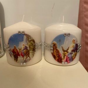 A pair of Hand decorated candles